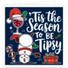 Funny Christmas card featuring an upside-down tipsy snowman balancing a glass of red wine, with candy cane, holly and present illustrations on a navy background and the message “’Tis the Season to Be Tipsy”.