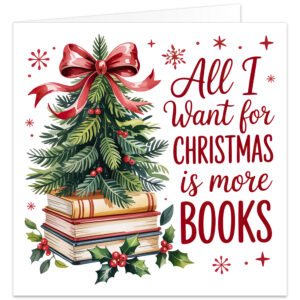 Book lover Christmas card featuring the text “All I Want for Christmas is More Books” in festive red lettering. The design shows a miniature evergreen Christmas tree arranged on a stack of books, decorated with red berries and topped with a large red ribbon bow. Holly, berries and red snowflakes surround the books on a clean white background, creating a cheerful festive design for readers, bookworms, teachers and librarians.