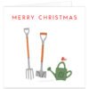 Gardener Christmas card featuring a festive robin perched on a green watering can with garden spade and fork in the snow.