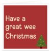 Northern Irish Christmas card with a festive red background, cream “Have a Great Wee Christmas” message and decorated Christmas tree illustration.