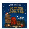 Hiking Christmas card with navy snowy background, mountains and pine trees. A red rucksack wrapped in festive lights sits beside walking boots, map, compass, lantern and mug. A Santa-hat trail sign points to Fresh Air, Good Company, Scenic Routes, Muddy Boots and Happy Heart. Text reads “Merry Christmas” and “May Your Trails Be Merry and Your Adventures Be Bright”, ideal for hikers, walkers, ramblers and hill walkers.
