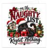 Funny cat Christmas card featuring a grumpy black cat wearing a red Santa hat, sitting in snow beside colourful presents, glowing lantern, holly, baubles and festive fairy lights. Bold red and black buffalo check text reads “On the Naughty List and Regret Nothing”, with paw print details on a white background. Humorous festive card design for a cat mum, cat dad, cat owner or cat lover.