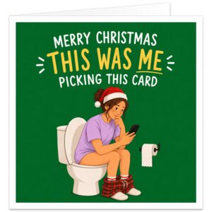 Funny Christmas card for him featuring a woman in a Santa hat sitting on the loo, looking at her phone, with the caption “Merry Christmas – This Was Me Picking This Card”.