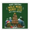 Hiking Christmas card for walkers, ramblers and hill walkers on a forest green background. Text reads “Merry Christmas, Walk More, Worry Less, Have a Great Christmas”. Festive winter scene features snowy mountains, pine trees and a wooden signpost decorated with Christmas lights and holly, pointing to Adventure, Fresh Air, Great Views, Good Company and Happy Christmas. A green rucksack, walking boots, trekking poles and red mug sit in the snow.