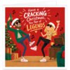 Funny Christmas card for a couple featuring the text “Have a Cracking Christmas, You Pair of Legends”. Colourful illustrated design shows a man and woman dancing at a festive party wearing Santa hats and sunglasses, holding celebratory drinks. Bright red background with decorated Christmas tree, presents, holly, fairy lights, record player and musical notes. Ideal for married couples, husband and wife, boyfriend and girlfriend or partners.