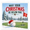 Funny golf Christmas card for male and female golfers featuring the text “May Your Christmas Be Below Par”. Festive design shows a snowy golf course with evergreen trees, a green putting surface, red flag with white snowflake and a large golf ball wearing a Santa hat. Red and dark green typography appears on a pale winter-blue background with a small holly detail.