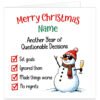 Funny personalised Christmas card featuring “Merry Christmas SARAH” in red and green text above “Another Year of Questionable Decisions”. Festive checklist reads “Set goals, Ignored them, Made things worse, No regrets” with red ticks. Includes a smiling snowman wearing sunglasses, red hat and striped scarf, raising a glass of bubbly against a clean white background.