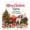 Funny personalised Christmas card for female best friend featuring the message "Merry Christmas [Name] – Best Friend. Worst Influence." Colourful festive illustration of two female friends in Christmas pyjamas, laughing and raising drinks on a green sofa. Decorated Christmas tree, wrapped presents, scattered decorations, empty bottles and sleeping dog create a chaotic festive scene. Personalised with recipient's name, printed on premium 300gsm matte white card, 14.8cm square.